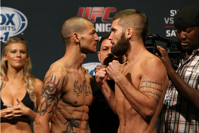 SAN ANTONIO, TX - JUNE 27: Cub Swanson (left) and Jeremy Stephens (right) pose after weighing in for their UFC Fight Night bout at the AT&T Center on June 27, 2014 in San Antonio, Texas. (Photo by Ed Mulholland/Zuffa LLC/Zuffa LLC via Getty Images)