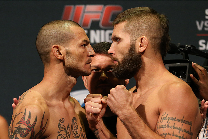 SAN ANTONIO, TX - JUNE 27: Cub Swanson (left) and Jeremy Stephens (right) pose after weighing in for their UFC Fight Night bout at the AT&T Center on June 27, 2014 in San Antonio, Texas. (Photo by Ed Mulholland/Zuffa LLC/Zuffa LLC via Getty Images)
