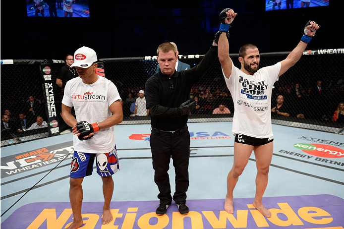 BANGOR, ME - AUGUST 16: (R-L) Frankie Saenz celebrates after defeating Nolan Ticman in their bantamweight bout during the UFC fight night event at the Cross Insurance Center on August 16, 2014 in Bangor, Maine. (Photo by Jeff Bottari/Zuffa LLC/Zuffa LLC