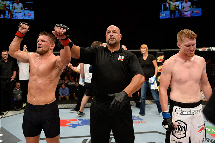 BANGOR, ME - AUGUST 16: (L-R) Tom Watson celebrates after defeating Sam Alvey in their middleweight bout during the UFC fight night event at the Cross Insurance Center on August 16, 2014 in Bangor, Maine. (Photo by Jeff Bottari/Zuffa LLC/Zuffa LLC via Ge