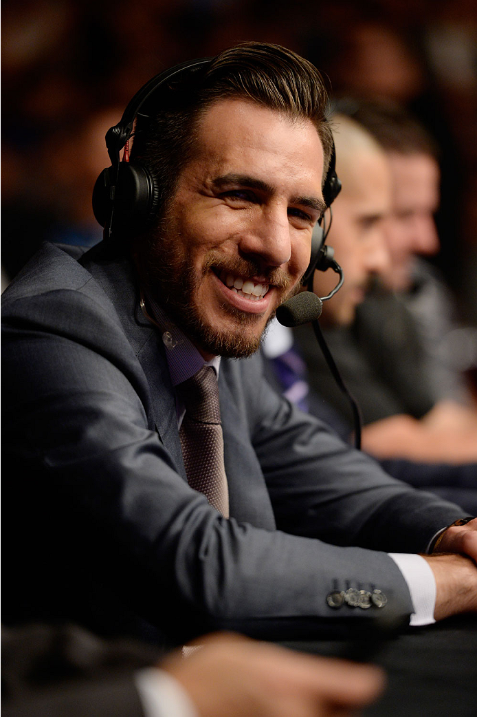 BANGOR, ME - AUGUST 16: UFC announcer Kenny Florian calls the fight between Thiago Tavares and Robbie Peralta in their featherweight bout during the UFC fight night event at the Cross Insurance Center on August 16, 2014 in Bangor, Maine. (Photo by Jeff B