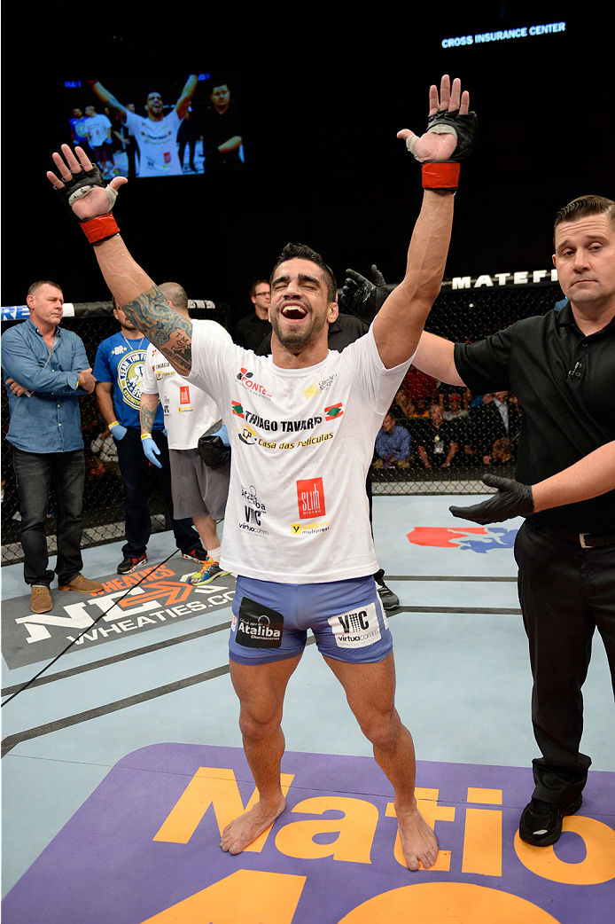 BANGOR, ME - AUGUST 16: Thiago Tavares celebrates after defeating Robbie Peralta in their featherweight bout during the UFC fight night event at the Cross Insurance Center on August 16, 2014 in Bangor, Maine. (Photo by Jeff Bottari/Zuffa LLC/Zuffa LLC vi