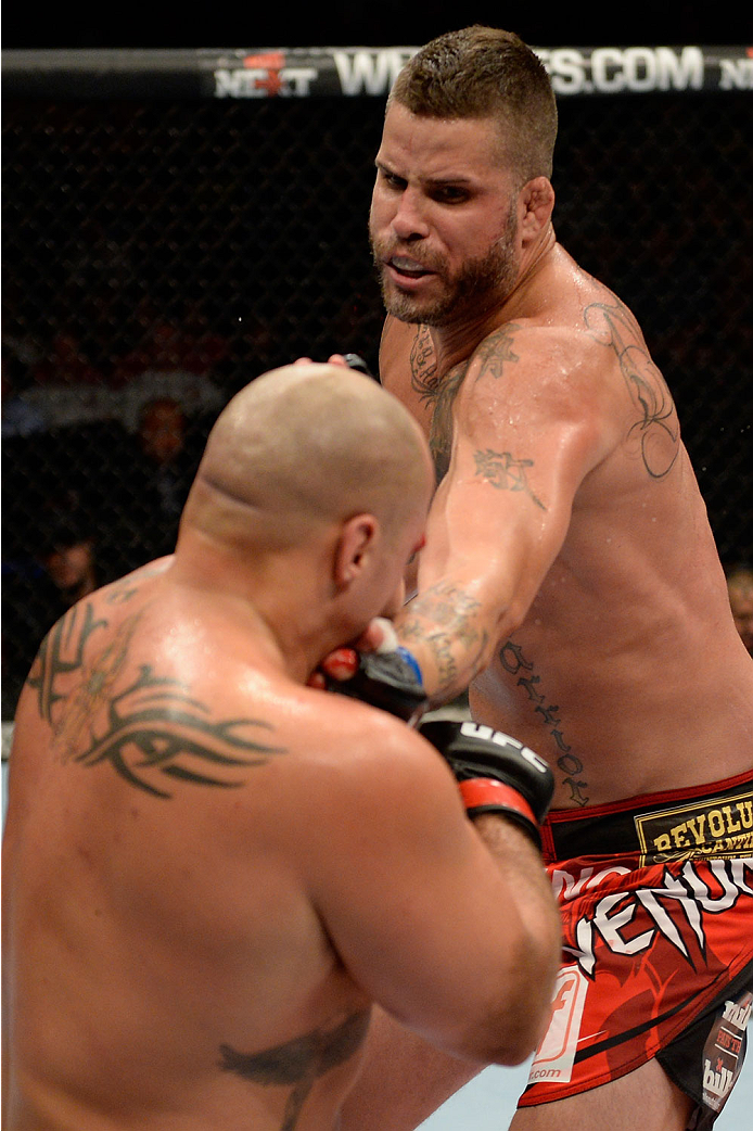 BANGOR, ME - AUGUST 16: (R-L) Jack May punches Shawn Jordan in their heavyweight bout during the UFC fight night event at the Cross Insurance Center on August 16, 2014 in Bangor, Maine. (Photo by Jeff Bottari/Zuffa LLC/Zuffa LLC via Getty Images)