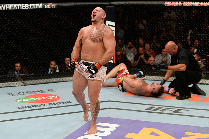 BANGOR, ME - AUGUST 16: (L-R) Shawn Jordan celebrates after defeating Jack May in their heavyweight bout during the UFC fight night event at the Cross Insurance Center on August 16, 2014 in Bangor, Maine. (Photo by Jeff Bottari/Zuffa LLC/Zuffa LLC via Ge