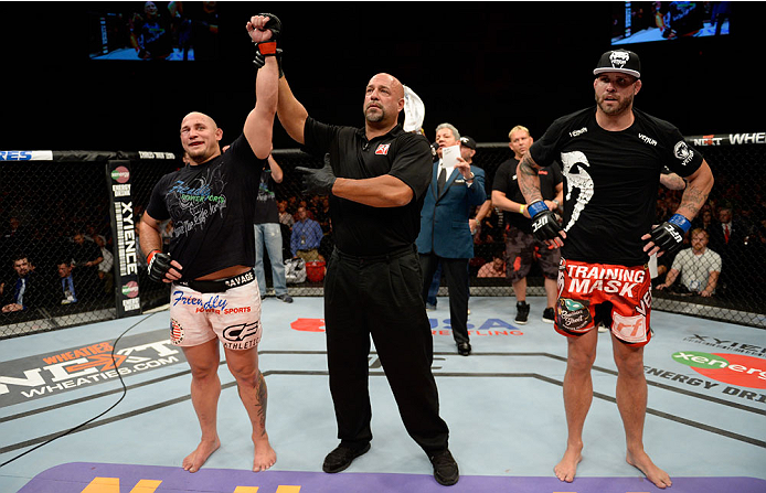 BANGOR, ME - AUGUST 16: (L-R) Shawn Jordan celebrates after defeating Jack May in their heavyweight bout during the UFC fight night event at the Cross Insurance Center on August 16, 2014 in Bangor, Maine. (Photo by Jeff Bottari/Zuffa LLC/Zuffa LLC via Ge