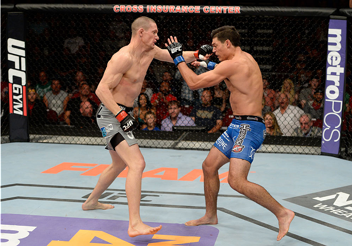 BANGOR, ME - AUGUST 16: (L-R) Seth Baczynski punches Alan Jouban in their welterweight bout during the UFC fight night event at the Cross Insurance Center on August 16, 2014 in Bangor, Maine. (Photo by Jeff Bottari/Zuffa LLC/Zuffa LLC via Getty Images)