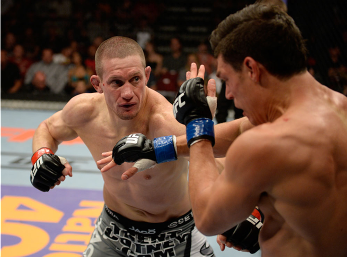 BANGOR, ME - AUGUST 16: (L-R) Seth Baczynski punches Alan Jouban in their welterweight bout during the UFC fight night event at the Cross Insurance Center on August 16, 2014 in Bangor, Maine. (Photo by Jeff Bottari/Zuffa LLC/Zuffa LLC via Getty Images)