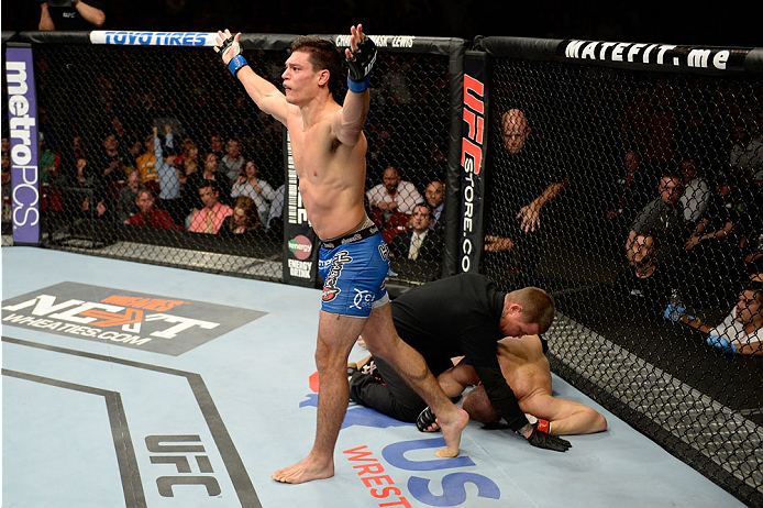BANGOR, ME - AUGUST 16: (L-R) Alan Jouban celebrates after knocking out Seth Baczynski in their welterweight bout during the UFC fight night event at the Cross Insurance Center on August 16, 2014 in Bangor, Maine. (Photo by Jeff Bottari/Zuffa LLC/Zuffa L