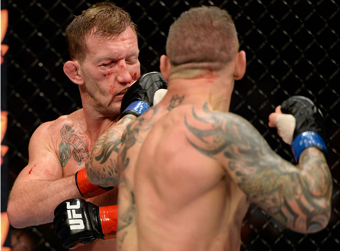 BANGOR, ME - AUGUST 16: (R-L) Ross Pearson knocks out Gray Maynard in their lightweight bout during the UFC fight night event at the Cross Insurance Center on August 16, 2014 in Bangor, Maine. (Photo by Jeff Bottari/Zuffa LLC/Zuffa LLC via Getty Images)