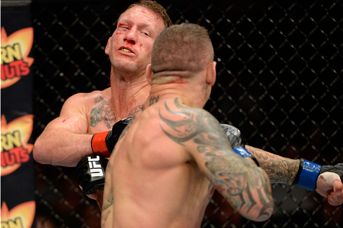 BANGOR, ME - AUGUST 16: (R-L) Ross Pearson knocks out Gray Maynard in their lightweight bout during the UFC fight night event at the Cross Insurance Center on August 16, 2014 in Bangor, Maine. (Photo by Jeff Bottari/Zuffa LLC/Zuffa LLC via Getty Images)
