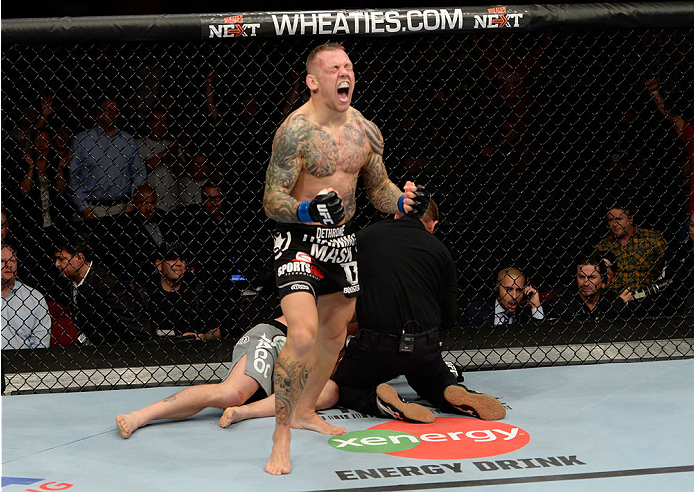 BANGOR, ME - AUGUST 16: Ross Pearson celebrates after knocking out Gray Maynard in their lightweight bout during the UFC fight night event at the Cross Insurance Center on August 16, 2014 in Bangor, Maine. (Photo by Jeff Bottari/Zuffa LLC/Zuffa LLC via G