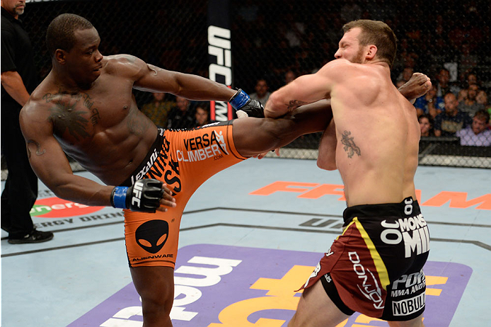 BANGOR, ME - AUGUST 16: (L-R) Ovince Saint Preux kicks Ryan Bader in their light heavyweight bout during the UFC fight night event at the Cross Insurance Center on August 16, 2014 in Bangor, Maine. (Photo by Jeff Bottari/Zuffa LLC/Zuffa LLC via Getty Ima