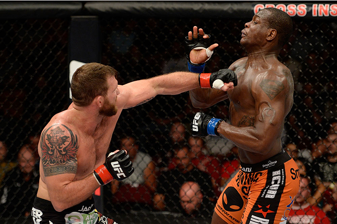BANGOR, ME - AUGUST 16: (L-R) Ryan Bader punches Ovince Saint Preux in their light heavyweight bout during the UFC fight night event at the Cross Insurance Center on August 16, 2014 in Bangor, Maine. (Photo by Jeff Bottari/Zuffa LLC/Zuffa LLC via Getty I