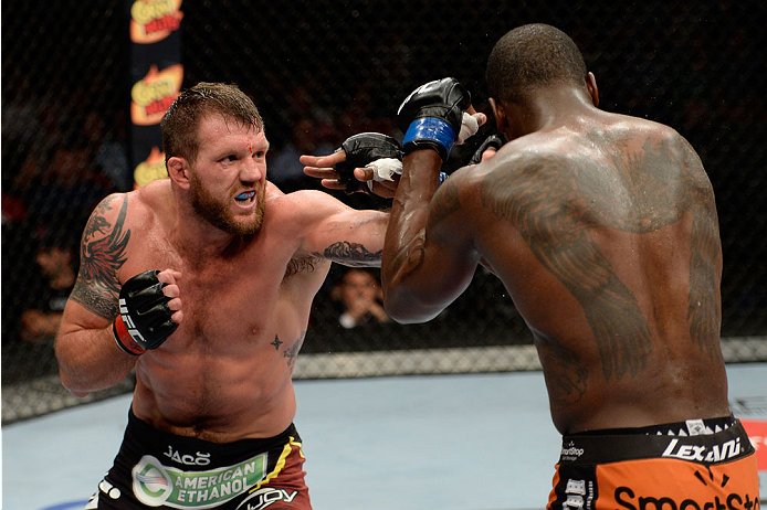 BANGOR, ME - AUGUST 16: (L-R) Ryan Bader punches Ovince Saint Preux in their light heavyweight bout during the UFC fight night event at the Cross Insurance Center on August 16, 2014 in Bangor, Maine. (Photo by Jeff Bottari/Zuffa LLC/Zuffa LLC via Getty I