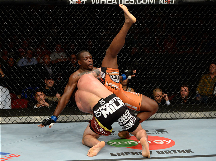 BANGOR, ME - AUGUST 16: (L-R) Ryan Bader takes down Ovince Saint Preux in their light heavyweight bout during the UFC fight night event at the Cross Insurance Center on August 16, 2014 in Bangor, Maine. (Photo by Jeff Bottari/Zuffa LLC/Zuffa LLC via Gett