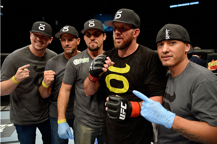 BANGOR, ME - AUGUST 16: Ryan Bader celebrates with his team after defeating Ovince Saint Preux in their light heavyweight bout during the UFC fight night event at the Cross Insurance Center on August 16, 2014 in Bangor, Maine. (Photo by Jeff Bottari/Zuff