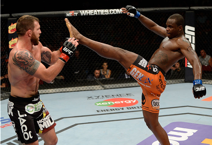 BANGOR, ME - AUGUST 16: (R-L) Ovince Saint Preux attempts to kick Ryan Bader in their light heavyweight bout during the UFC fight night event at the Cross Insurance Center on August 16, 2014 in Bangor, Maine. (Photo by Jeff Bottari/Zuffa LLC/Zuffa LLC vi