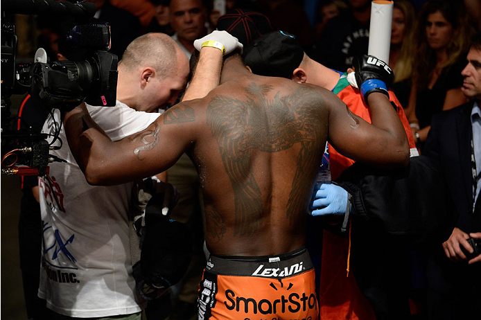 BANGOR, ME - AUGUST 16: Ovince Saint Preux prays with his team before facing Ryan Bader in their light heavyweight bout during the UFC fight night event at the Cross Insurance Center on August 16, 2014 in Bangor, Maine. (Photo by Jeff Bottari/Zuffa LLC/Z