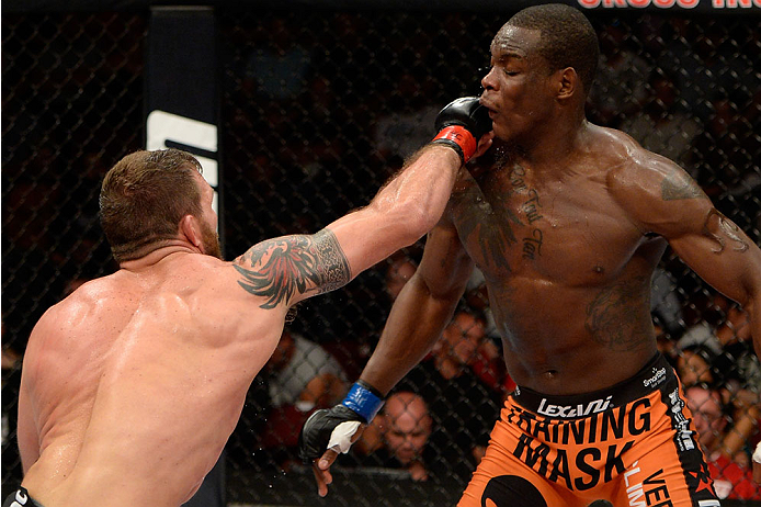 BANGOR, ME - AUGUST 16: (L-R) Ryan Bader punches Ovince Saint Preux in their light heavyweight bout during the UFC fight night event at the Cross Insurance Center on August 16, 2014 in Bangor, Maine. (Photo by Jeff Bottari/Zuffa LLC/Zuffa LLC via Getty I