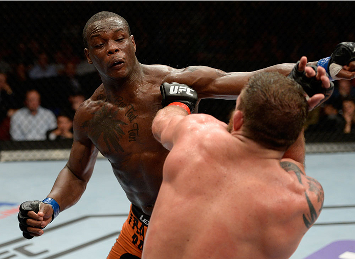 BANGOR, ME - AUGUST 16: (L-R) Ovince Saint Preux throws a punch at Ryan Bader in their light heavyweight bout during the UFC fight night event at the Cross Insurance Center on August 16, 2014 in Bangor, Maine. (Photo by Jeff Bottari/Zuffa LLC/Zuffa LLC v