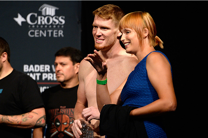 BANGOR, ME - AUG 15: (L-R) Sam Alvey and wife McKey Sullivan stand on stage during the UFC fight night weigh-in at the Cross Insurance Center on August 15, 2014 in Bangor, Maine. (Photo by Jeff Bottari/Zuffa LLC/Zuffa LLC via Getty Images)