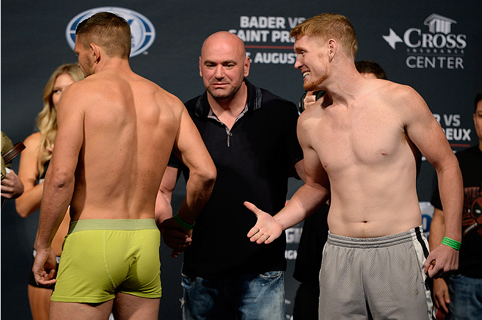 BANGOR, ME - AUG 15: (L-R) Tom Watson walks away from Sam Alvey during the UFC fight night weigh-in at the Cross Insurance Center on August 15, 2014 in Bangor, Maine. (Photo by Jeff Bottari/Zuffa LLC/Zuffa LLC via Getty Images)
