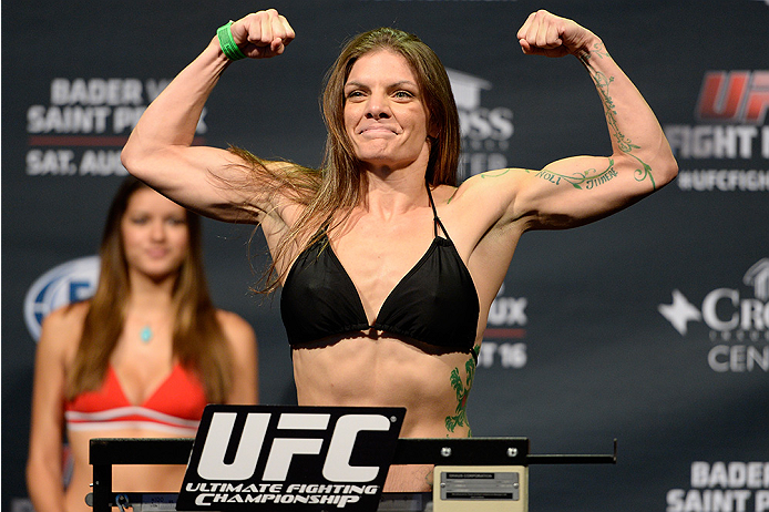 BANGOR, ME - AUG 15: Lauren Murphy steps on the scale during the UFC fight night weigh-in at the Cross Insurance Center on August 15, 2014 in Bangor, Maine. (Photo by Jeff Bottari/Zuffa LLC/Zuffa LLC via Getty Images)