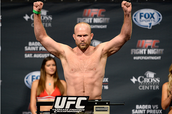 BANGOR, ME - AUG 15: Tim Boetsch steps on the scale during the UFC fight night weigh-in at the Cross Insurance Center on August 15, 2014 in Bangor, Maine. (Photo by Jeff Bottari/Zuffa LLC/Zuffa LLC via Getty Images)