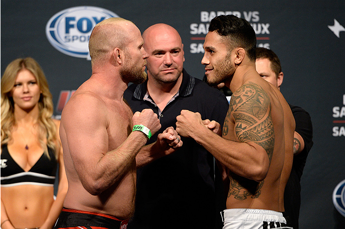 BANGOR, ME - AUG 15: (L-R) Tim Boetsch and Brad Tavares face off during the UFC fight night weigh-in at the Cross Insurance Center on August 15, 2014 in Bangor, Maine. (Photo by Jeff Bottari/Zuffa LLC/Zuffa LLC via Getty Images)