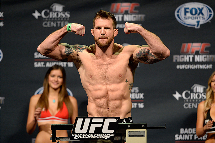 BANGOR, ME - AUG 15: Ryan Bader steps on the scale during the UFC fight night weigh-in at the Cross Insurance Center on August 15, 2014 in Bangor, Maine. (Photo by Jeff Bottari/Zuffa LLC/Zuffa LLC via Getty Images)