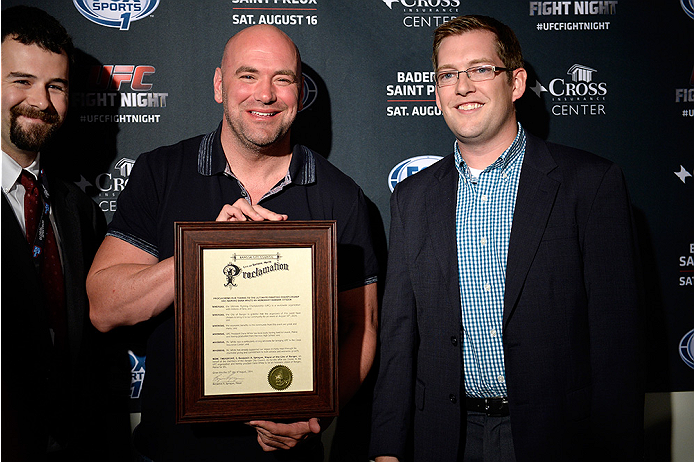BANGOR, ME - AUG 15: (R-L) Bangor Mayor Benjamin A. Sprague presents UFC President Dana White with a proclamation of thanks entitling him as an honorary citizen for life during the UFC fight night weigh-in at the Cross Insurance Center on August 15, 2014