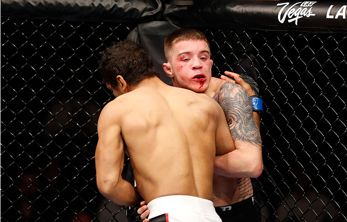 BERLIN, GERMANY - MAY 31: Maximo Blanco (L) fights Andy Ogle during the Maximo Blanco vs. Andy Ogle at UFC Fight Night Berlin event at O2 World on May 31, 2014 in Berlin, Germany. (Photo by Boris Streubel/Zuffa LLC/Zuffa LLC via Getty Images)