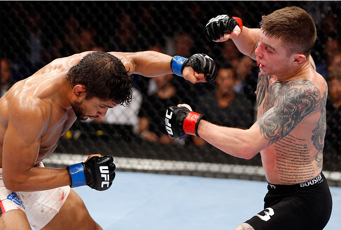 BERLIN, GERMANY - MAY 31: Maximo Blanco (L) fights Andy Ogle during the Maximo Blanco vs. Andy Ogle at UFC Fight Night Berlin event at O2 World on May 31, 2014 in Berlin, Germany. (Photo by Boris Streubel/Zuffa LLC/Zuffa LLC via Getty Images)