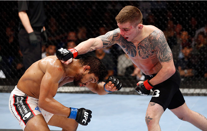 BERLIN, GERMANY - MAY 31: Maximo Blanco (L) fights Andy Ogle during the Maximo Blanco vs. Andy Ogle at UFC Fight Night Berlin event at O2 World on May 31, 2014 in Berlin, Germany. (Photo by Boris Streubel/Zuffa LLC/Zuffa LLC via Getty Images)