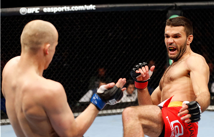 BERLIN, GERMANY - MAY 31: Pawel Pawlak (L) fights Peter Sobotta during the Pawel Pawlak vs. Peter Sobotta at UFC Fight Night Berlin event at O2 World on May 31, 2014 in Berlin, Germany. (Photo by Boris Streubel/Zuffa LLC/Zuffa LLC via Getty Images)