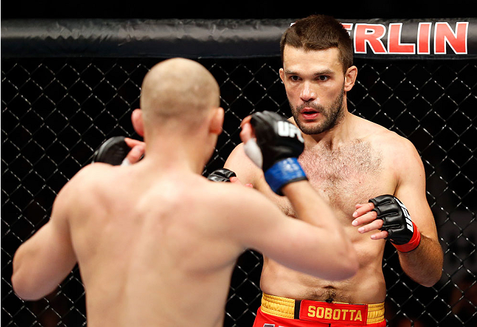 BERLIN, GERMANY - MAY 31: Pawel Pawlak (L) fights Peter Sobotta during the Pawel Pawlak vs. Peter Sobotta at UFC Fight Night Berlin event at O2 World on May 31, 2014 in Berlin, Germany. (Photo by Boris Streubel/Zuffa LLC/Zuffa LLC via Getty Images)
