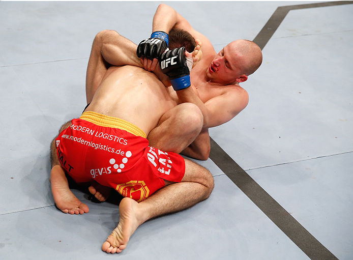 BERLIN, GERMANY - MAY 31: Pawel Pawlak (R) fights Peter Sobotta during the Pawel Pawlak vs. Peter Sobotta at UFC Fight Night Berlin event at O2 World on May 31, 2014 in Berlin, Germany. (Photo by Boris Streubel/Zuffa LLC/Zuffa LLC via Getty Images)