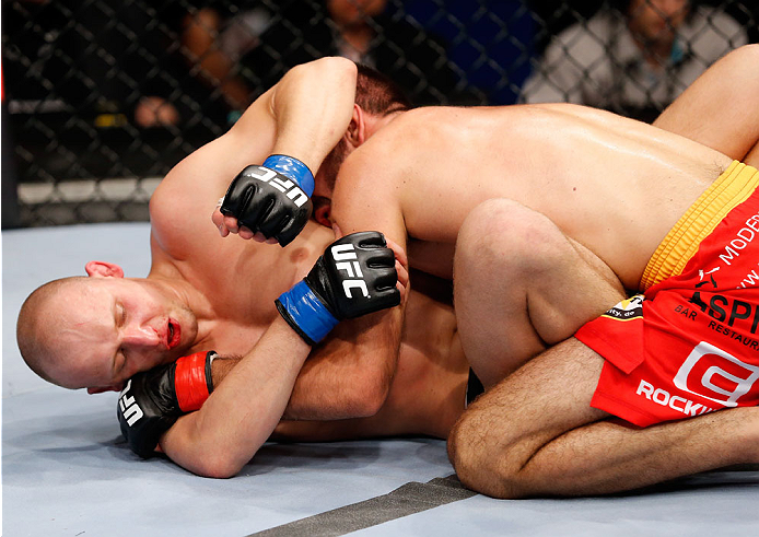 BERLIN, GERMANY - MAY 31: Pawel Pawlak (L) fights Peter Sobotta during the Pawel Pawlak vs. Peter Sobotta at UFC Fight Night Berlin event at O2 World on May 31, 2014 in Berlin, Germany. (Photo by Boris Streubel/Zuffa LLC/Zuffa LLC via Getty Images)