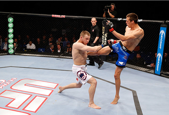 BERLIN, GERMANY - MAY 31: Magnus Cedenblad (R) fights Krzysztof Jotko during the Krzysztof Jotko vs. Magnus Cedenblad at UFC Fight Night Berlin event at O2 World on May 31, 2014 in Berlin, Germany. (Photo by Boris Streubel/Zuffa LLC/Zuffa LLC via Getty I