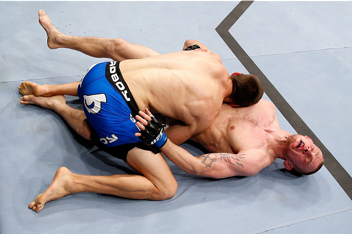 BERLIN, GERMANY - MAY 31: Magnus Cedenblad (L) fights Krzysztof Jotko during the Krzysztof Jotko vs. Magnus Cedenblad at UFC Fight Night Berlin event at O2 World on May 31, 2014 in Berlin, Germany. (Photo by Boris Streubel/Zuffa LLC/Zuffa LLC via Getty