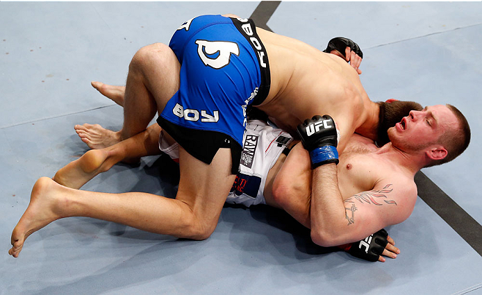 BERLIN, GERMANY - MAY 31: Magnus Cedenblad (L) fights Krzysztof Jotko during the Krzysztof Jotko vs. Magnus Cedenblad at UFC Fight Night Berlin event at O2 World on May 31, 2014 in Berlin, Germany. (Photo by Boris Streubel/Zuffa LLC/Zuffa LLC via Getty