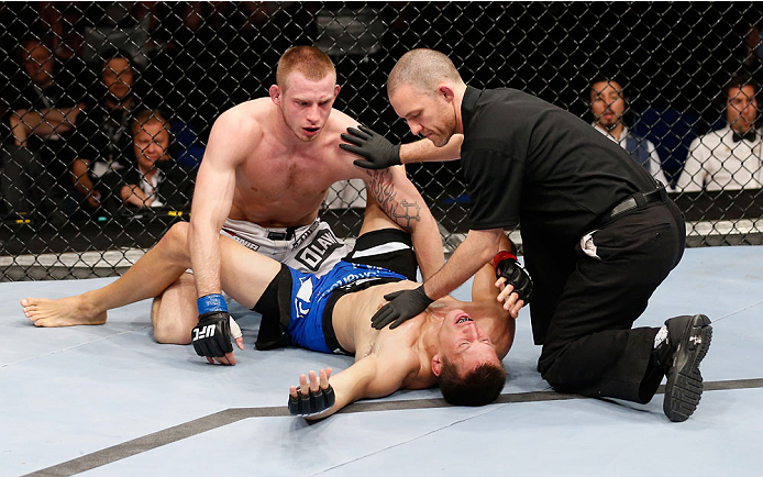 BERLIN, GERMANY - MAY 31: Magnus Cedenblad (R) fights Krzysztof Jotko during the Krzysztof Jotko vs. Magnus Cedenblad at UFC Fight Night Berlin event at O2 World on May 31, 2014 in Berlin, Germany. (Photo by Boris Streubel/Zuffa LLC/Zuffa LLC via Getty