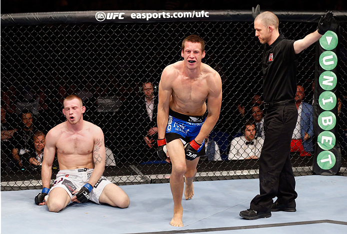 BERLIN, GERMANY - MAY 31: Magnus Cedenblad (C) celebrates next to Krzysztof Jotko after winning the Krzysztof Jotko vs. Magnus Cedenblad at UFC Fight Night Berlin event at O2 World on May 31, 2014 in Berlin, Germany. (Photo by Boris Streubel/Zuffa LLC/Z