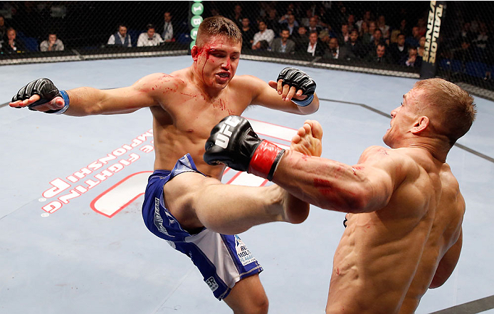 BERLIN, GERMANY - MAY 31: Drew Dober (L) fights Nick Hein during the Drew Dober vs. Nick Hein at UFC Fight Night Berlin event at O2 World on May 31, 2014 in Berlin, Germany. (Photo by Boris Streubel/Zuffa LLC/Zuffa LLC via Getty Images)