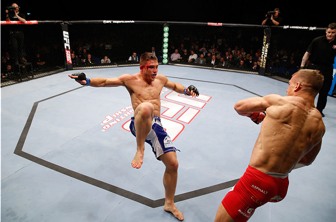 BERLIN, GERMANY - MAY 31: Drew Dober (L) fights Nick Hein during the Drew Dober vs. Nick Hein at UFC Fight Night Berlin event at O2 World on May 31, 2014 in Berlin, Germany. (Photo by Boris Streubel/Zuffa LLC/Zuffa LLC via Getty Images)