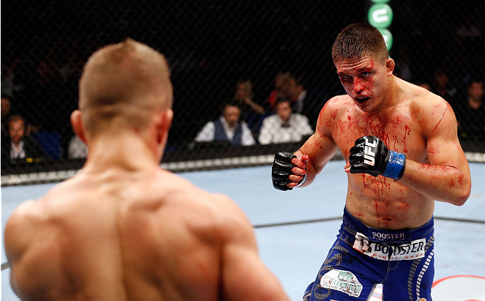 BERLIN, GERMANY - MAY 31: Drew Dober (R) fights Nick Hein during the Drew Dober vs. Nick Hein at UFC Fight Night Berlin event at O2 World on May 31, 2014 in Berlin, Germany. (Photo by Boris Streubel/Zuffa LLC/Zuffa LLC via Getty Images)