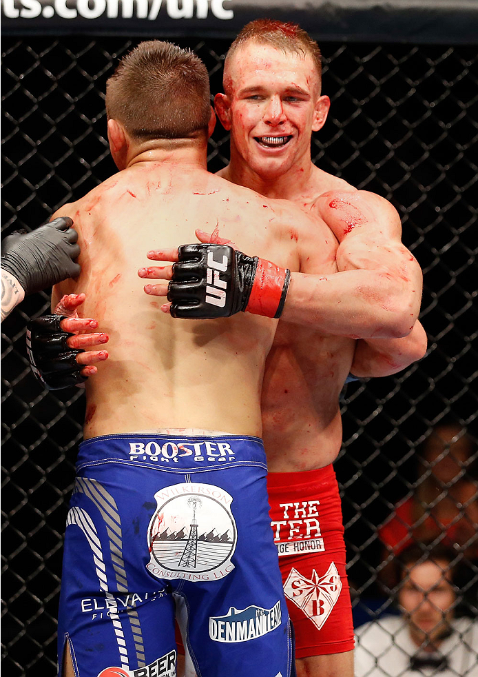 BERLIN, GERMANY - MAY 31: Drew Dober (L) hugs Nick Hein after the Drew Dober vs. Nick Hein at UFC Fight Night Berlin event at O2 World on May 31, 2014 in Berlin, Germany. (Photo by Boris Streubel/Zuffa LLC/Zuffa LLC via Getty Images)