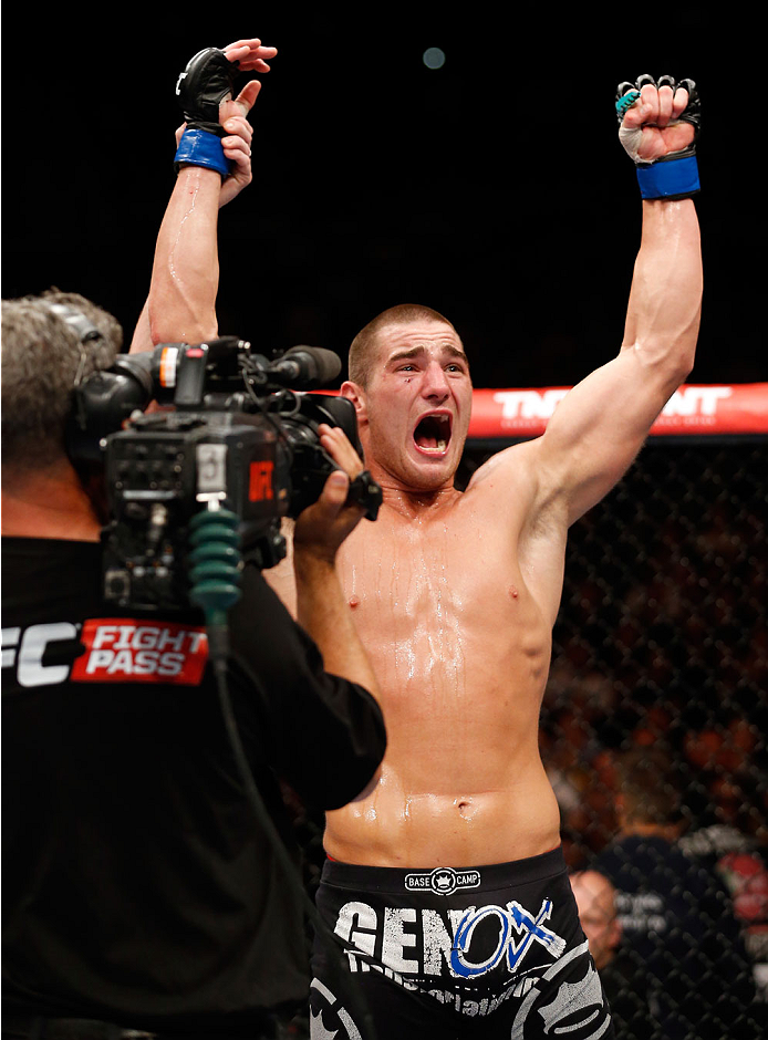 BERLIN, GERMANY - MAY 31: Sean Strickland celebrates after winning the Sean Strickland vs. Luke Barnatt match at UFC Fight Night Berlin event at O2 World on May 31, 2014 in Berlin, Germany. (Photo by Boris Streubel/Zuffa LLC/Zuffa LLC via Getty Images)