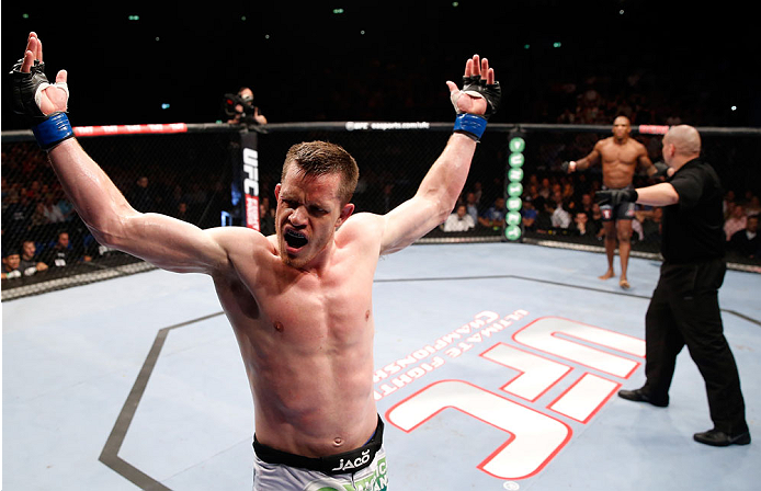 BERLIN, GERMANY - MAY 31: C.B. Dollaway celebrates after winning the C.B. Dollaway vs. Francis Carmont match at UFC Fight Night Berlin event at O2 World on May 31, 2014 in Berlin, Germany. (Photo by Boris Streubel/Zuffa LLC/Zuffa LLC via Getty Images)