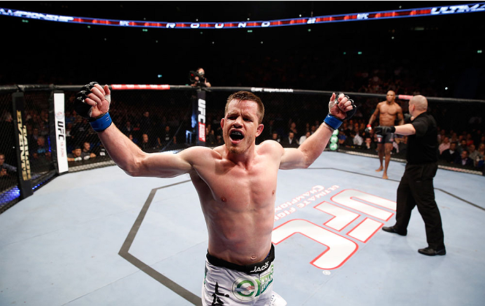BERLIN, GERMANY - MAY 31: C.B. Dollaway celebrates after winning the C.B. Dollaway vs. Francis Carmont match at UFC Fight Night Berlin event at O2 World on May 31, 2014 in Berlin, Germany. (Photo by Boris Streubel/Zuffa LLC/Zuffa LLC via Getty Images)